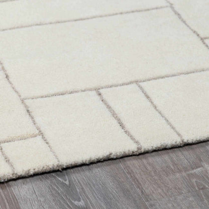 Fusao Off White Area Rug by Boutique Rugs with plush texture and ivory grid pattern on Tampa Home & Garden Store