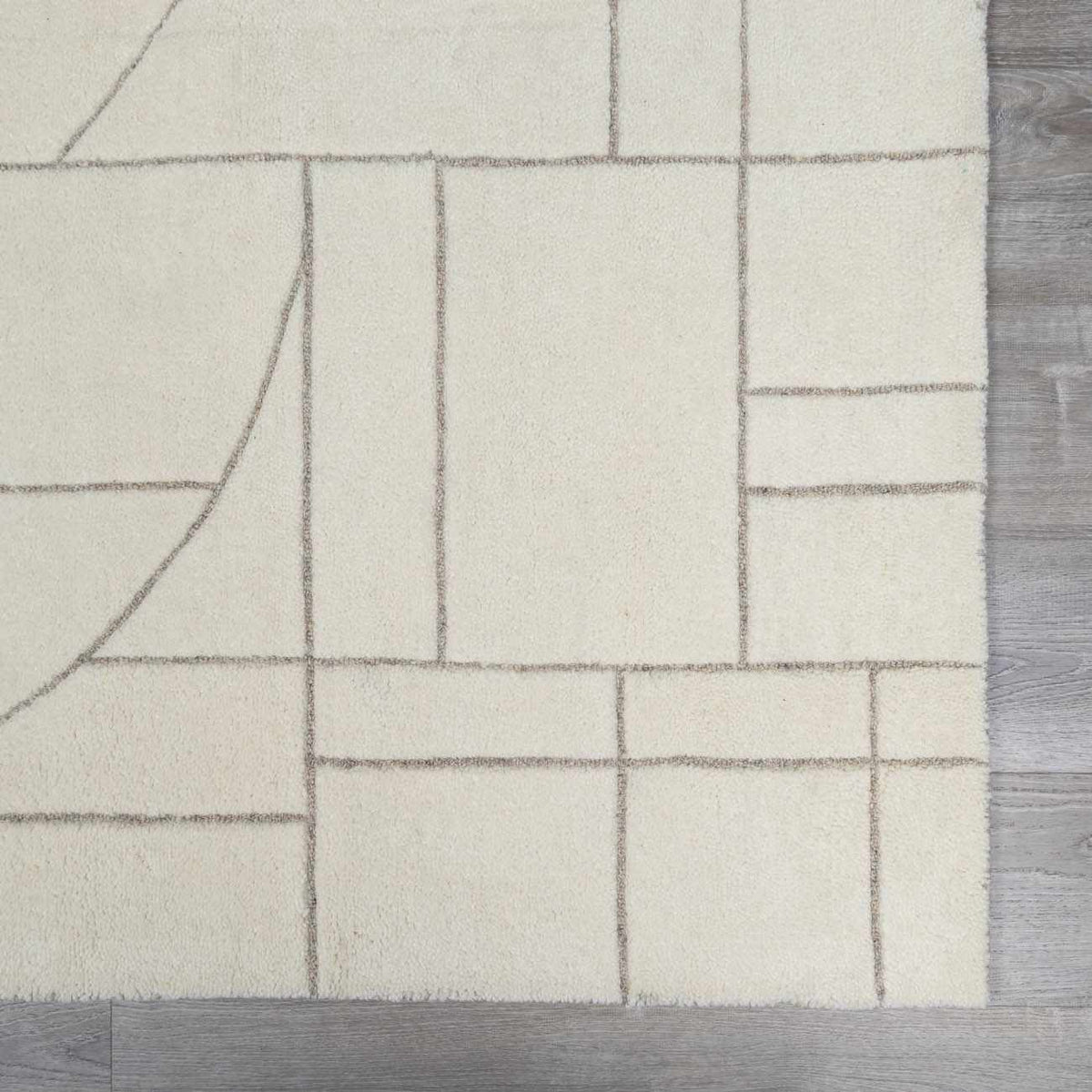 Fusao Off White Area Rug by Boutique Rugs with beige grid pattern on Tampa Home & Garden Store