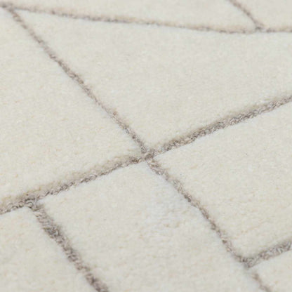 Fusao Off White Area Rug with cream tones and subtle grid lines by Boutique Rugs on Tampa Home & Garden Store