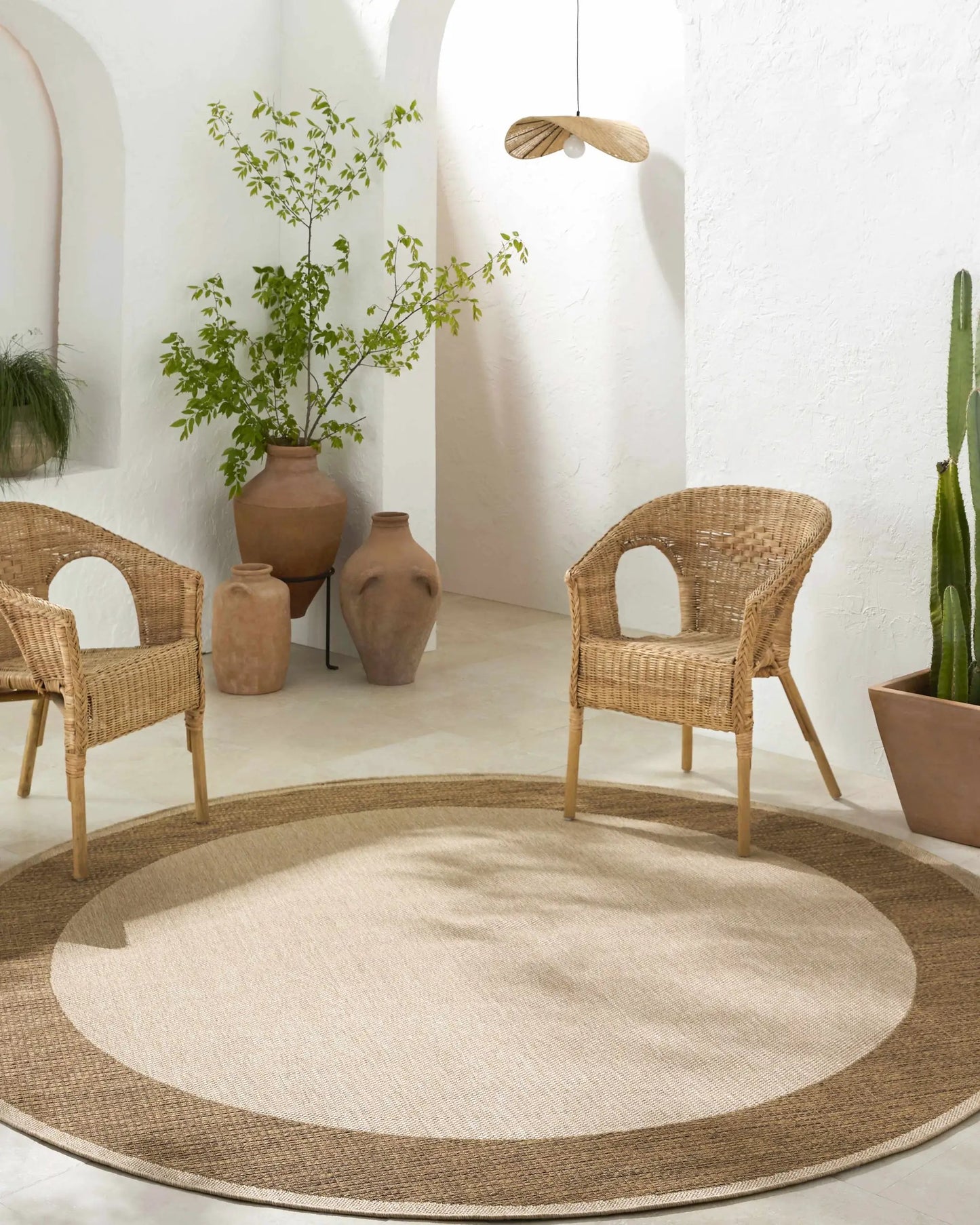 Inigo Flatweave Faux Jute Outdoor Rug Boutique Rugs, round natural beige outdoor rug on Tampa Home & Garden Store