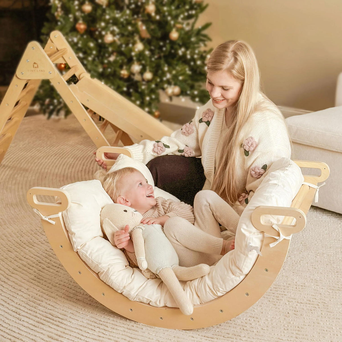 Tiny Land Thick Padded Play Cushion curved wooden seat, kids play near a Christmas tree on Tampa Home & Garden Store