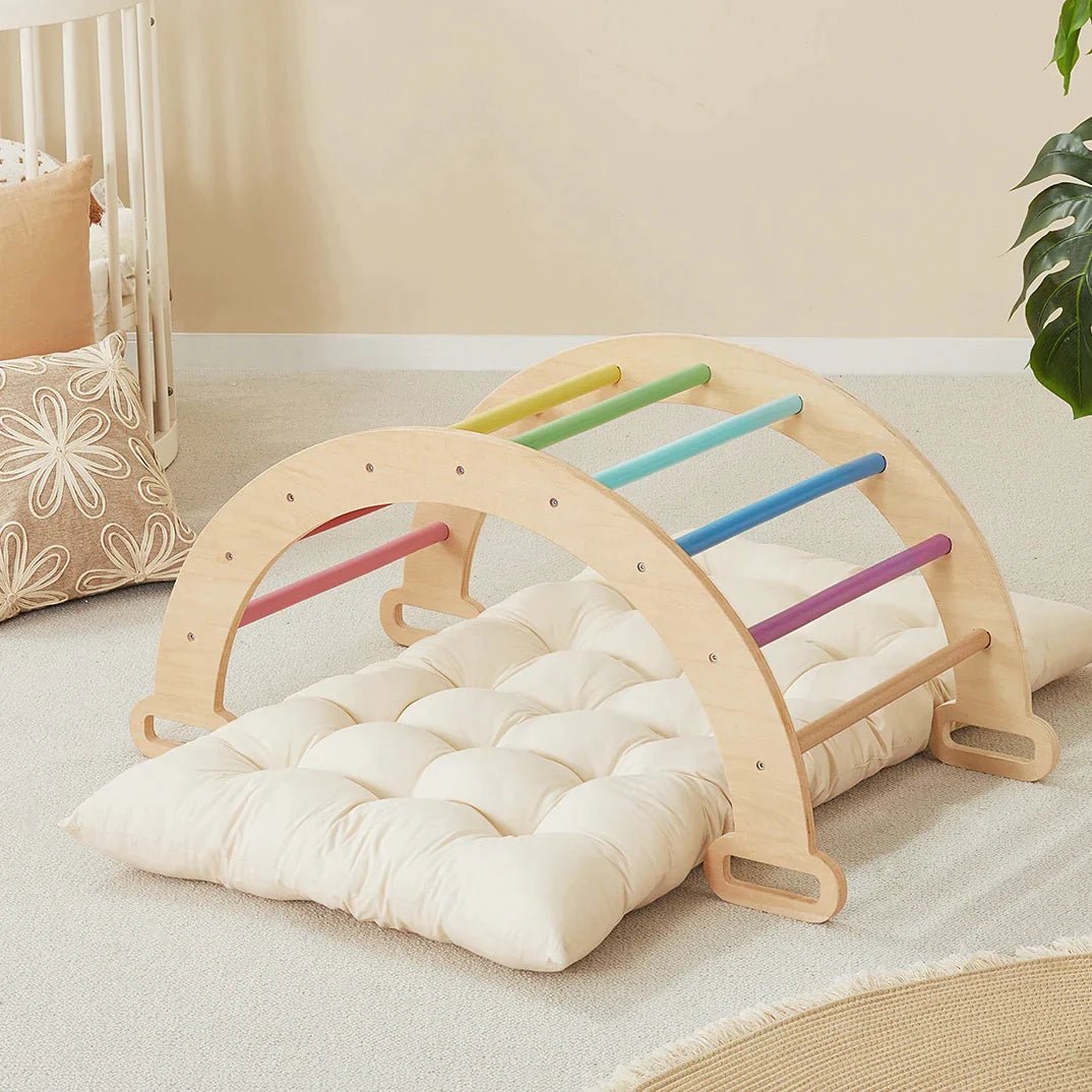 Tiny Land INC 7-in-1 Rainbow Climbing Set with Play Pad, wooden arches and pastel rainbow rungs on Tampa Home & Garden Store