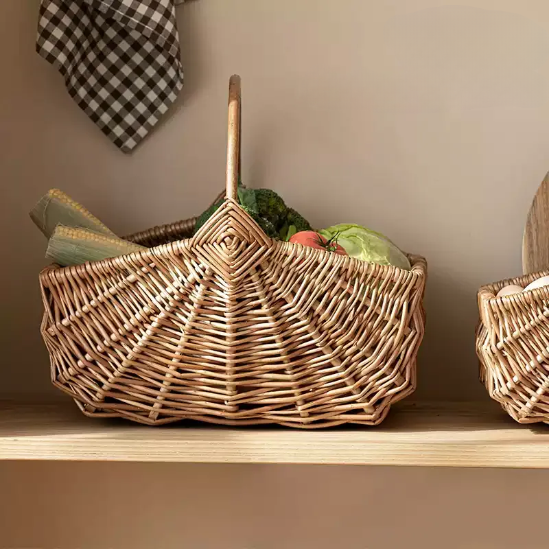 Two RusticReach fan-woven market baskets in natural wicker with handles; large basket holds produce on Tampa Home & Garden Store