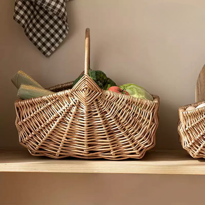 Two RusticReach fan-woven market baskets in natural wicker with handles; large basket holds produce on Tampa Home & Garden Store