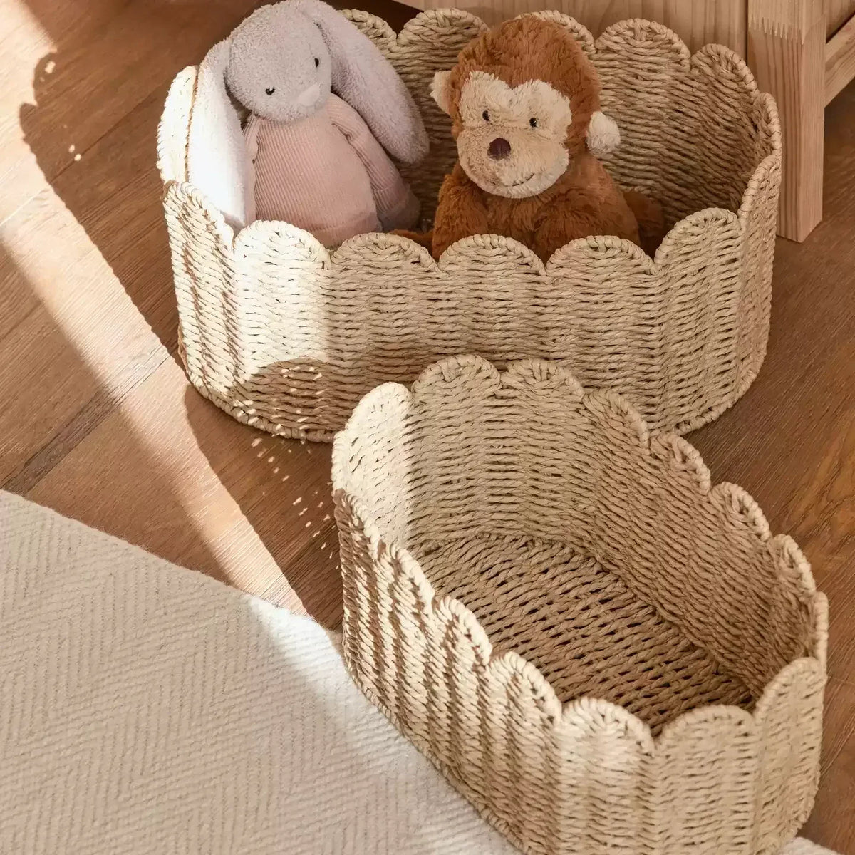 Meadow Scallop Basket natural woven storage basket with bunny and dog plush on Tampa Home & Garden Store