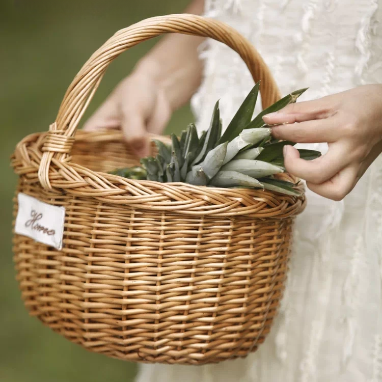 Orchard Market Basket natural wicker basket with handle, filled with pineapple crowns RusticReach on Tampa Home & Garden Store