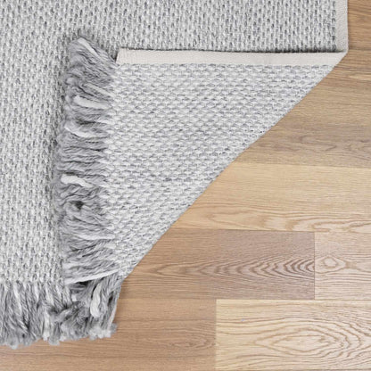 Stenhousemuir Luxe Handmade Rug in light gray woven texture with fringe by Boutique Rugs on Tampa Home & Garden Store