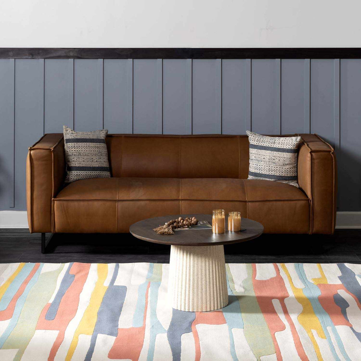 Southfields Colorful Modern Carpet abstract rug under brown leather sofa Boutique Rugs on Tampa Home & Garden Store