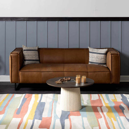 Southfields Colorful Modern Carpet abstract rug under brown leather sofa Boutique Rugs on Tampa Home & Garden Store