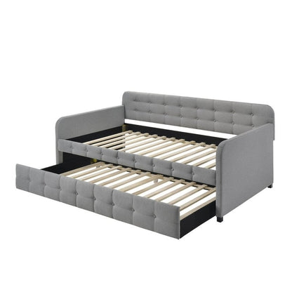 Sofá cama doble de lino y poliéster con botones en color gris y nido