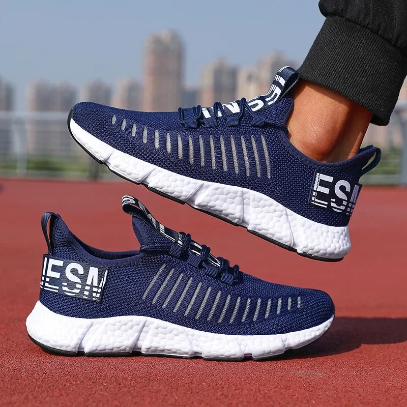 Training Sneakers EstaliosFit navy breathable mesh shoes with white foam soles, pair on Tampa Home & Garden Store