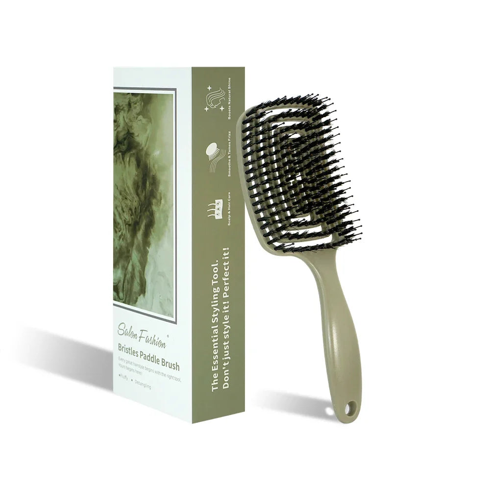 Beige boar-bristle detangling hair brush with anti-static bristles beside its green box on Tampa Home & Garden Store