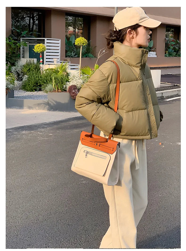 Women Winter Cropped Puffer Jacket olive with beige pants and beige cap, orange crossbody bag on Tampa Home & Garden Store