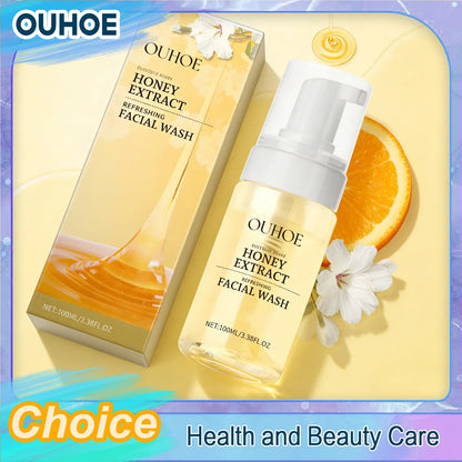 OUHOE Honey Extract Facial Wash pump bottles with orange and white flowers on display on Tampa Home & Garden Store