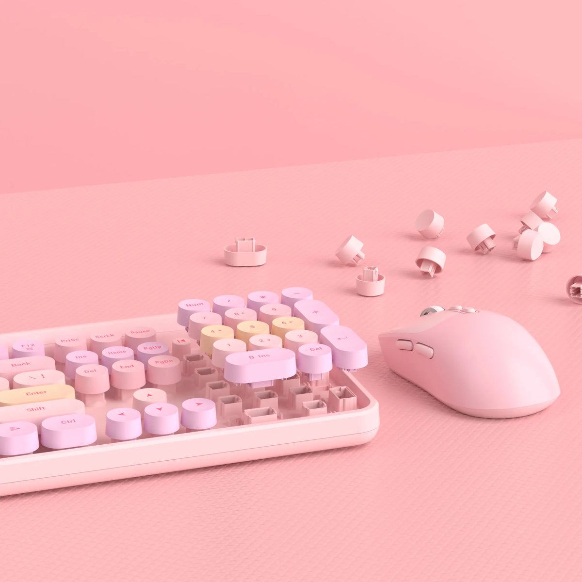 MageGee V920 keyboard and mouse set with pastel color keycaps on a pink desk on Tampa Home & Garden Store