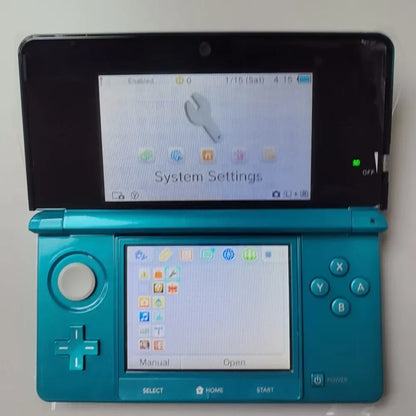 Refurbished Nintendo 3DS handheld in teal with dual screens and blue buttons by FLIPSTYLEZLLC on Tampa Home & Garden Store