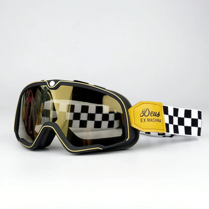 Retro Goggles Motocross with gold frame, mirrored lenses, checker strap and Deus patch on Tampa Home & Garden Store
