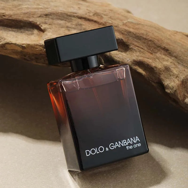 Dolo & Ganbana the one men's perfume bottle with dark amber gradient glass and black cap on Tampa Home & Garden Store