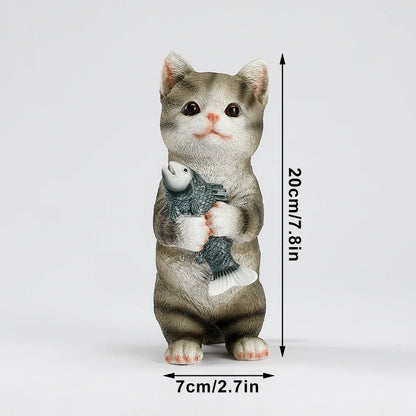 Cat figurine outdoor garden statue holding a fish; gray-white kitten, 20cm tall, 7cm wide on Tampa Home & Garden Store