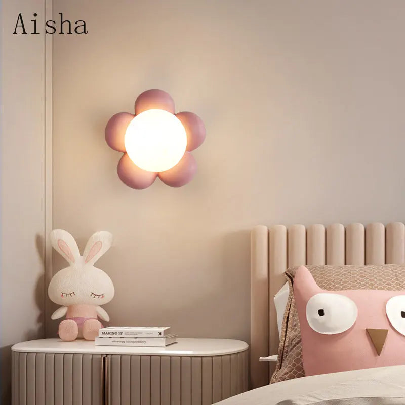 DecorBites Kids amusement park flower LED wall lamp with pink petals, mounted on beige wall on Tampa Home & Garden Store