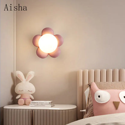 DecorBites Kids amusement park flower LED wall lamp with pink petals, mounted on beige wall on Tampa Home & Garden Store