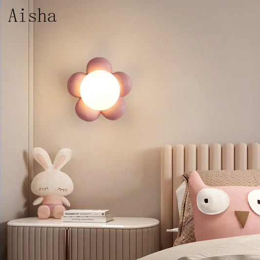 DecorBites Kids amusement park flower LED wall lamp with pink petals, mounted on beige wall on Tampa Home & Garden Store