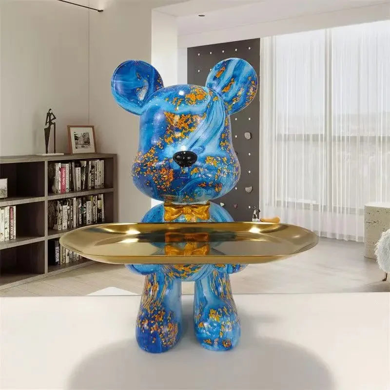 Perfecsy graffiti bear figurine, blue abstract finish with gold speckles, holding a gold tray on Tampa Home & Garden Store