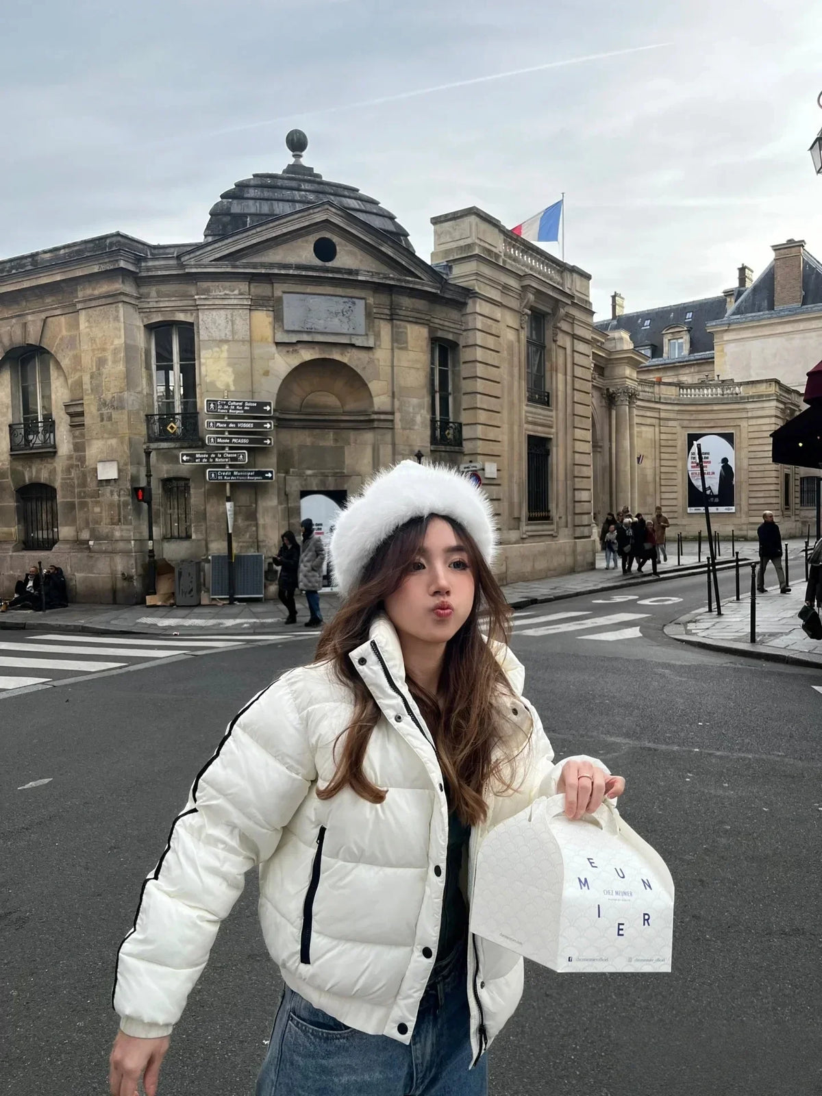 White hooded winter jacket for women by UpTrend Deals, thick padded puffer coat on city street on Tampa Home & Garden Store