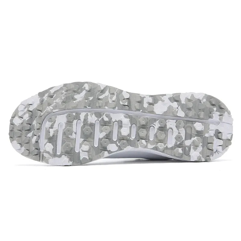 EstaliosFit golf shoes outsole with gray/white camo tread and multi-directional lugs on Tampa Home & Garden Store