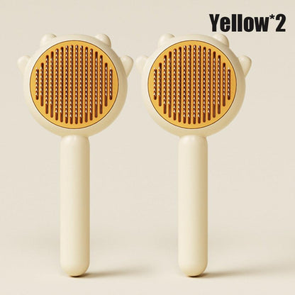 Stevvex cat grooming brush set with two yellow massage combs and cream handles on Tampa Home & Garden Store
