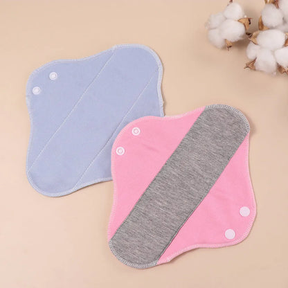 Two reusable menstrual cloth pads pink with gray center stripe and blue 23cm graphene fabric on Tampa Home & Garden Store