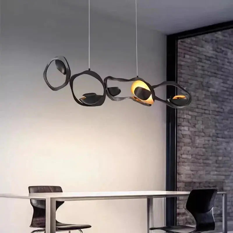 DecorBites LED pendant chandelier with sculptural black loops and warm glow on Tampa Home & Garden Store