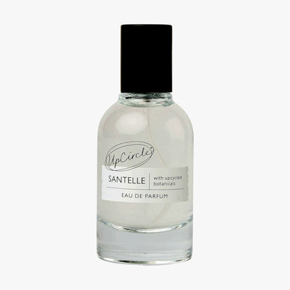 Santelle Eau De Parfum bottle by UpCircle, clear glass with black cap and minimalist label on Tampa Home & Garden Store