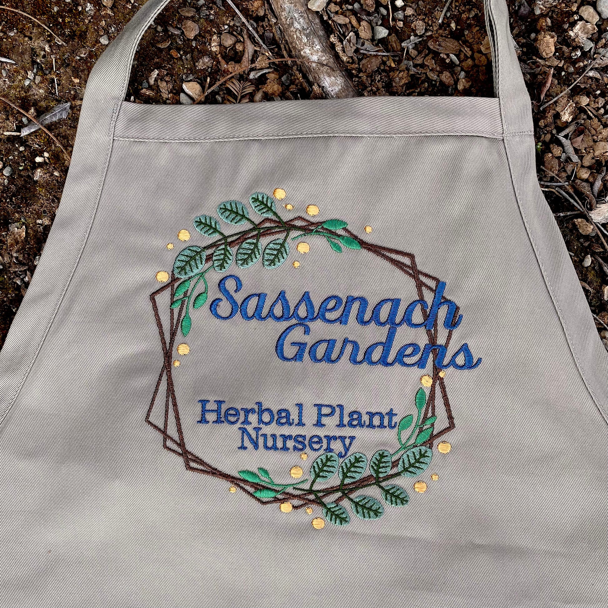 Sassenach Gardens Herbal Plant Nursery Embroidered Gardening Apron - Craftsman and Canvas Style Options - Tampa Home & Garden Store