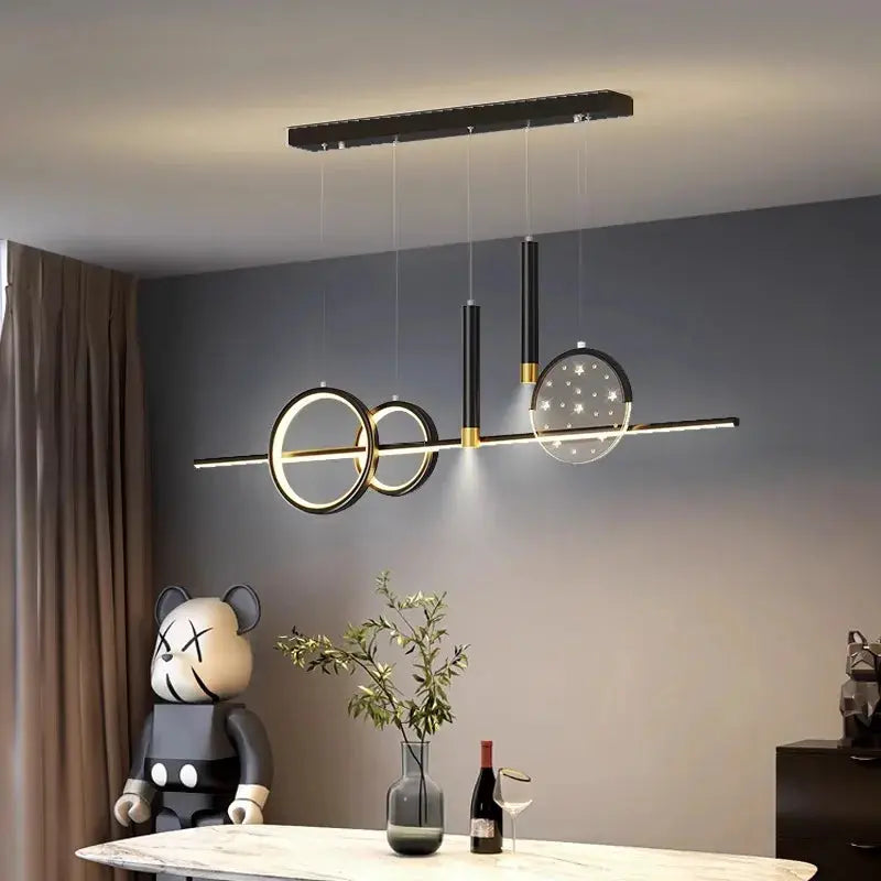 DecorBites LED pendant chandelier with black bar and circular rings, gold accents on Tampa Home & Garden Store
