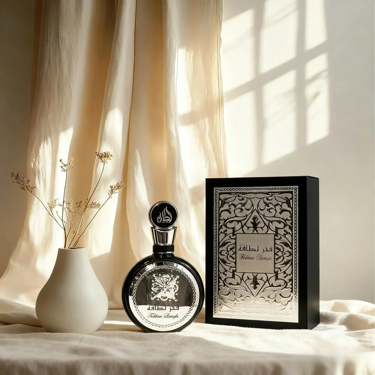 100ml luxury perfume bottle with ornate black-silver box and Arabic label beside white vase on Tampa Home & Garden Store