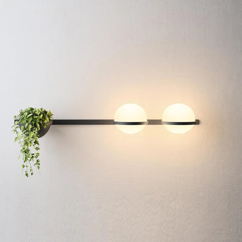 DecorBites LED Art Deco Plant Wall Light with two frosted globe bulbs on a black metal bar on Tampa Home & Garden Store