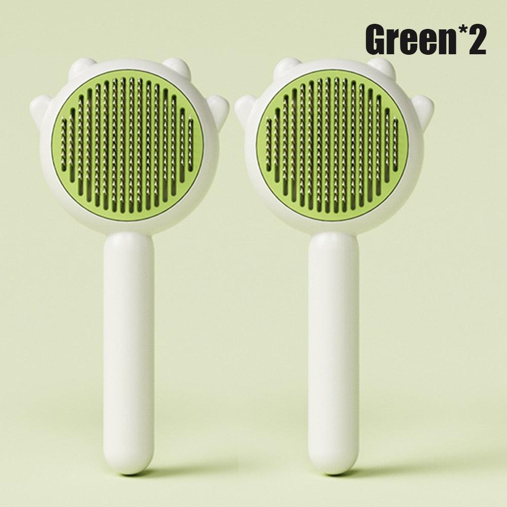 Pet grooming brush set with two green circular bristle heads and handles for cats and dogs on Tampa Home & Garden Store