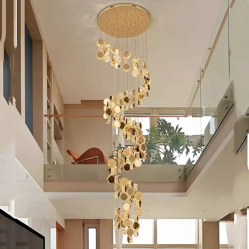 DecorBites LED pendant chandelier with gold discs cascading from a ceiling mount in living room on Tampa Home & Garden Store