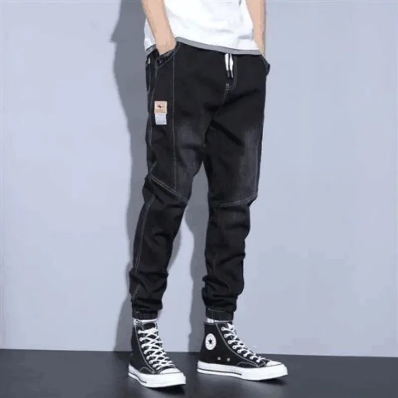 Men's wide-leg black jogger jeans by UpTrend Deals with white drawstring and patch tag on Tampa Home & Garden Store