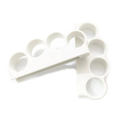 White plastic controller holder with circular recesses for Switch Joy-Cons, by FLIPSTYLEZLLC on Tampa Home & Garden Store