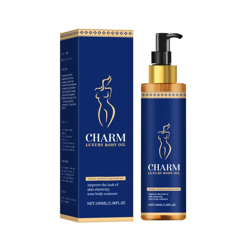 Charm Luxury Body Oil bottle with gold pump beside blue box and gold silhouette logo on Tampa Home & Garden Store