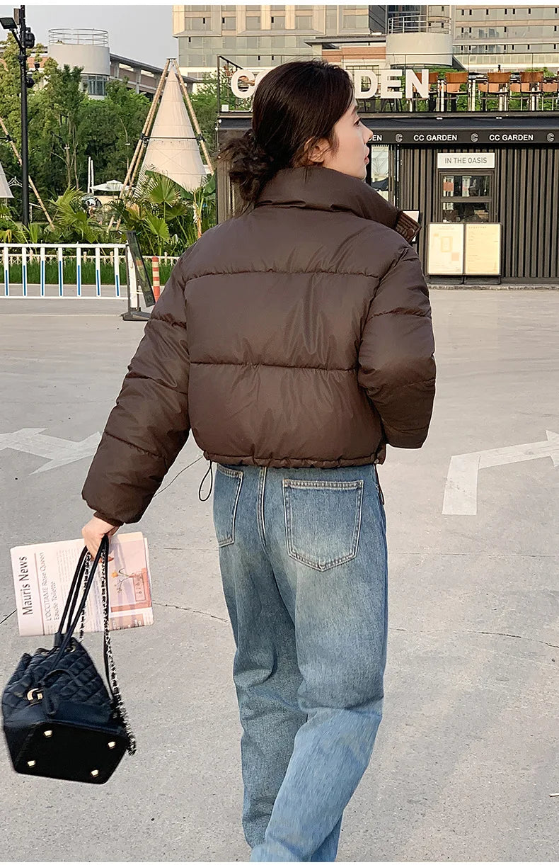 Women Winter Cropped Jacket cotton-padded puffer worn with jeans and a black bag on Tampa Home & Garden Store
