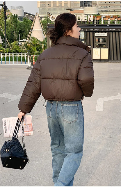 Women Winter Cropped Jacket cotton-padded puffer worn with jeans and a black bag on Tampa Home & Garden Store