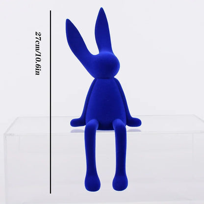 Blue resin flocked rabbit statue, Perfecsy tabletop bunny decor for display on Tampa Home & Garden Store