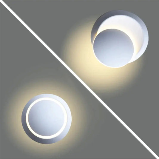 Two rotatable LED wall lights by Moktan Sabai white aluminum indoor fixtures with ring LEDs on Tampa Home & Garden Store