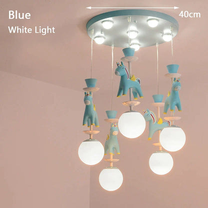 DecorBites Kids Dream Carousel Chandelier with blue unicorn pendants and white globe lights on Tampa Home & Garden Store