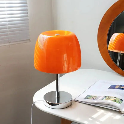 Perfecsy orange glass table lamp with chrome stem and round base on white desk on Tampa Home & Garden Store