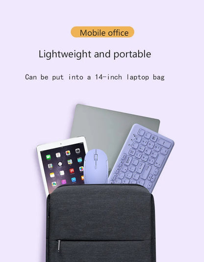 Wireless purple keyboard and mouse set with tablet and laptop in a gray backpack on Tampa Home & Garden Store