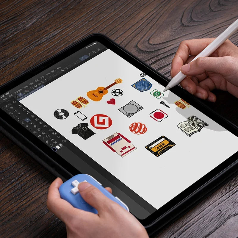 8BitDo Micro Bluetooth Wireless Gamepad blue shown with tablet and stylus during drawing on Tampa Home & Garden Store